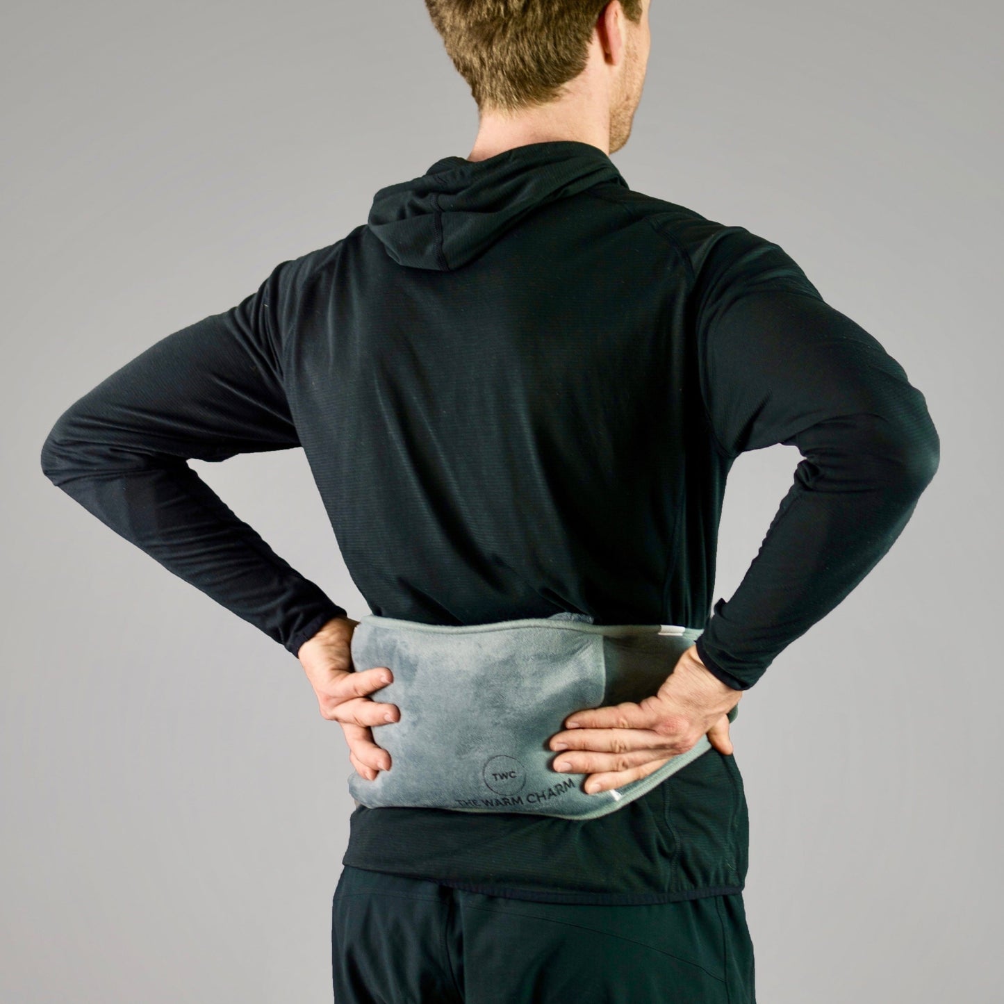 the warm charm's electric heat pack with belt for back pain relief